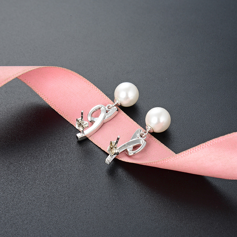 Pendientes de accesorios populares de estilo simple de mujer estilo japonés y coreano s925 pendientes de perlas de plata pendientes de joyería de moda al por mayor