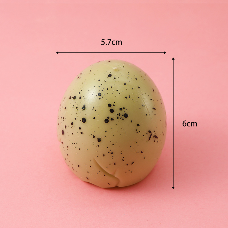 Red famosa novedad huevo de dinosaurio extruido juguete taza de dinosaurio para niños pellizco pellizco de escape bola de escape pegamento suave huevo