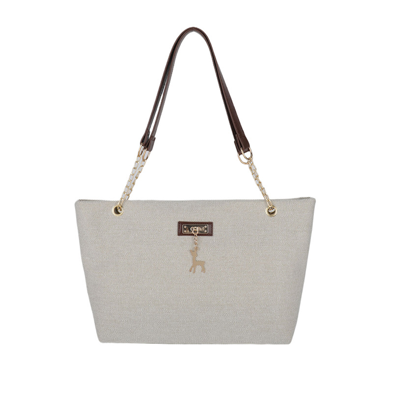 Textura simple, bolso de hombro versátil 2024 nueva moda moda de gran capacidad, bolso de transporte ligero, bolso de brazo