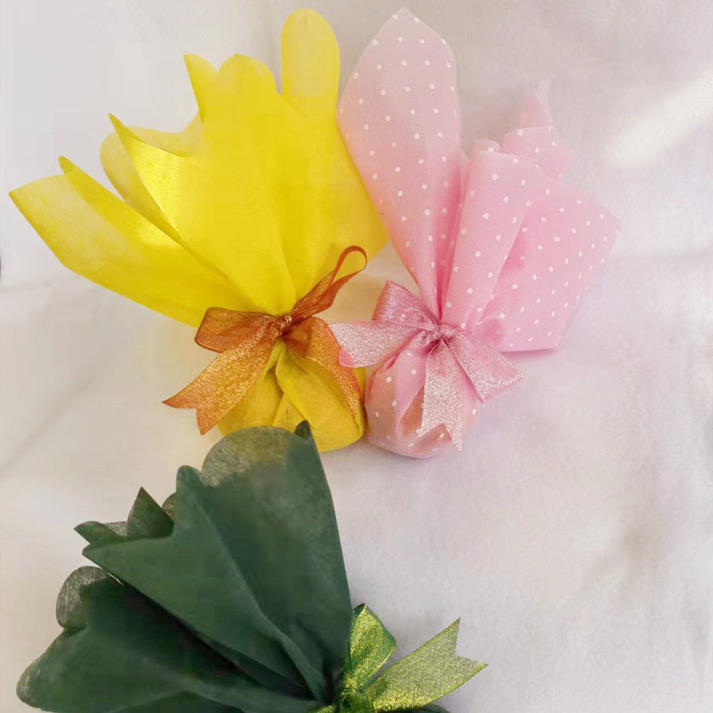 圣诞绿色平安果鲜花礼品包装无纺布荷叶边贝壳边圆形方形包装纸