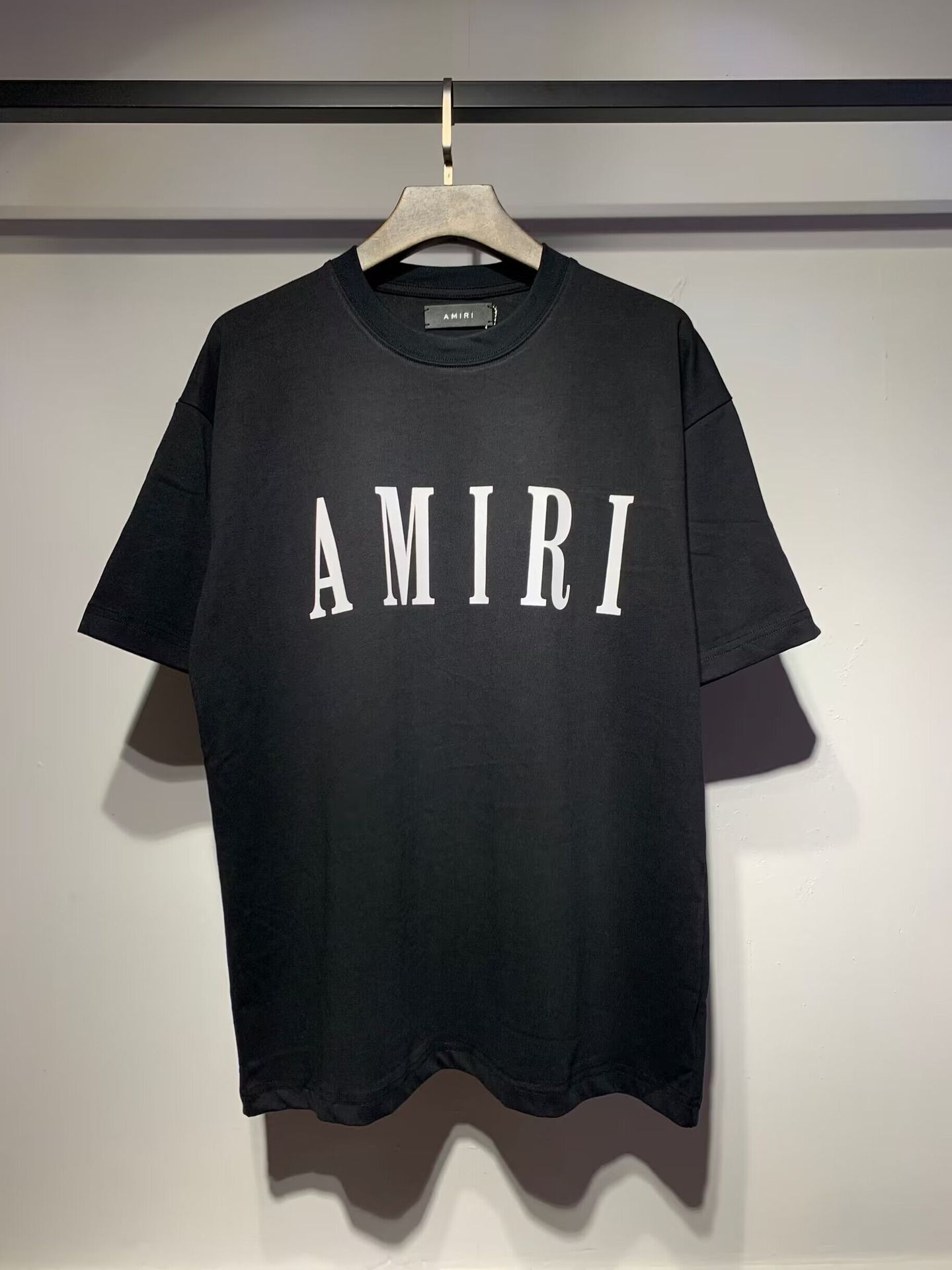 Verano nueva camiseta de manga corta impresa de letras suelta marca de moda hombre camiseta casual de media manga mujer
