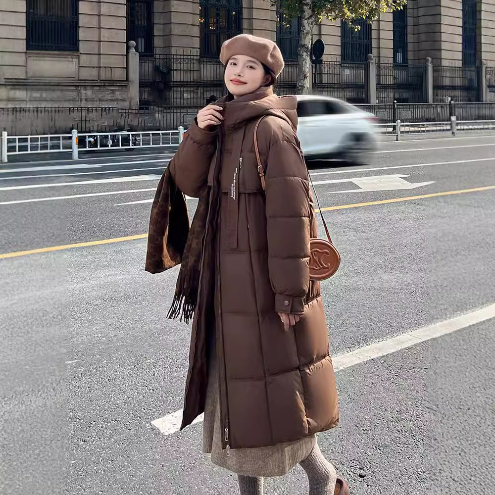 Algodón de mujer largo grueso aire caliente suelto estilo académico coreano con capuchón de algodón de color sólido comercio exterior abrigo transfronterizo