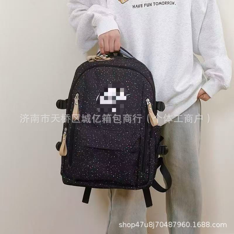 新款户外大容量满天星双肩包男运动校园女学生电脑包耐尅字母书包