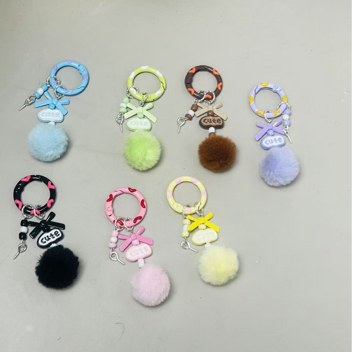 Creative handmade colorful pom-pom keychains, phone chains, blind boxes, cute beaded pendants, bag charms, adorable