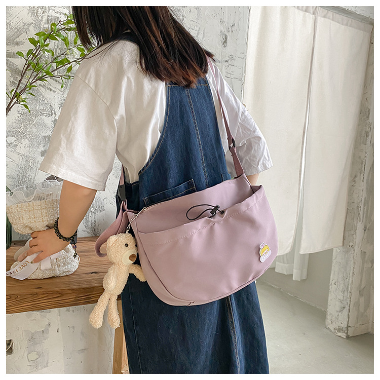 The new 2022 Little Bear canvas small bag for women is simple and versatile. The student dumpling bag is a trendy casual single-shoulder crossbody bag undefined