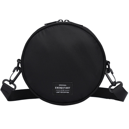 New trendy brand crossbody bag for men—casual, niche-style round single-shoulder bag; chic hand-held small round bag—Japanese-inspired design for women.