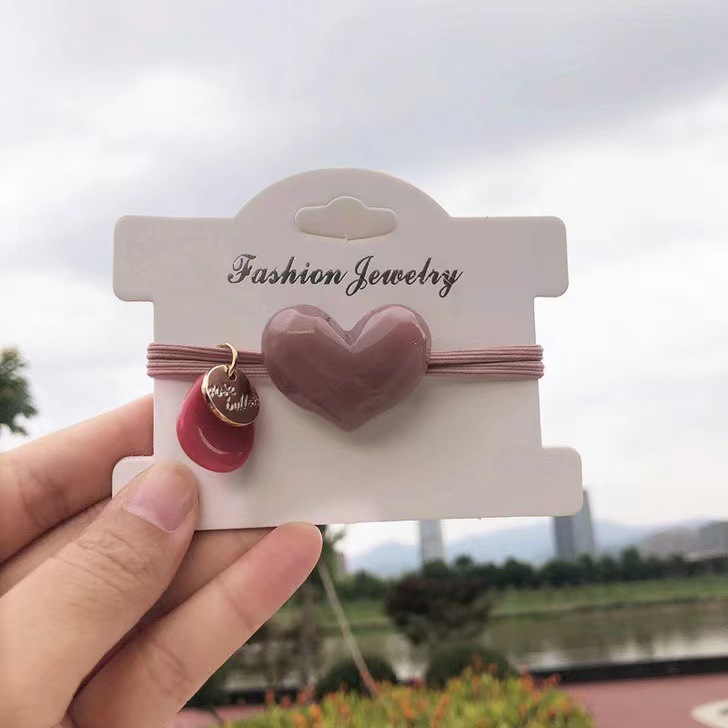 Elástico joyas de cabello de moda con frijoles frescos M anillo de cereza cuerda de cabello al por mayor de la banda de goma cabeza de 100 bolas de cabello rojo una variedad de alta elástica