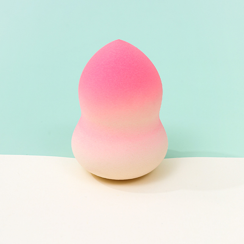 Fábrica personalizada de color degradado transfronterizo maquillaje de belleza soplo de huevo no come polvo no látex color spray gota de agua esponja de maquillaje de calabaza