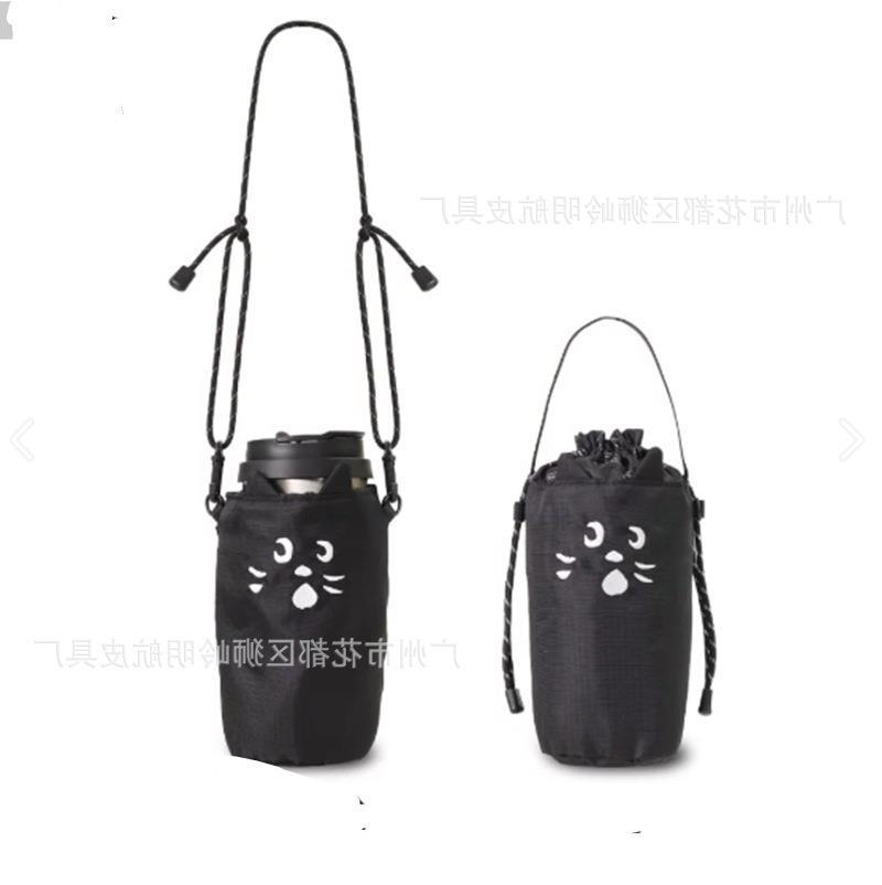 现货日系新款可爱惊讶猫杯套猫咪单肩斜挎水壶套简约手提杯套包