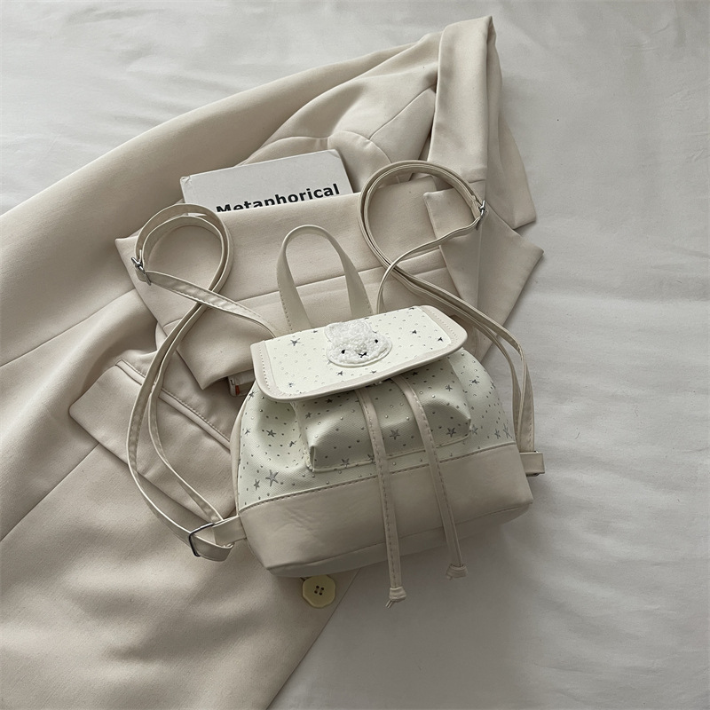 Mochila de moda coreana encantadora nicho femenino diario dulce estrella ondulado punto mochila de estudiantes mochila universal