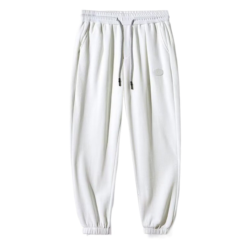 Pantalones de chándal waffle Pantalones deportivos casuales de los hombres pantalones de los hombres otoño e invierno marca de moda japonesa de los hombres sueltos atados al tobillo