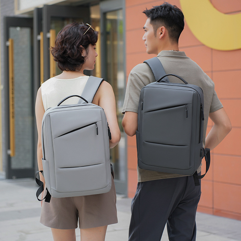 Mochila expandible 2025 simple y ligera a prueba de rociamientos barra de tracción bolsa de computadora de negocios mochila de negocios de gran capacidad