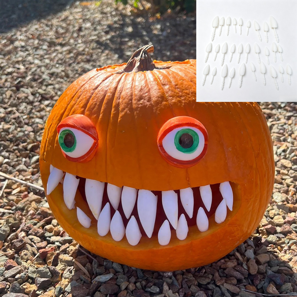Halloween DIY pumpkin lantern handmade carving using fresh real pumpkins, materials and tools for making small pumpkin teeth