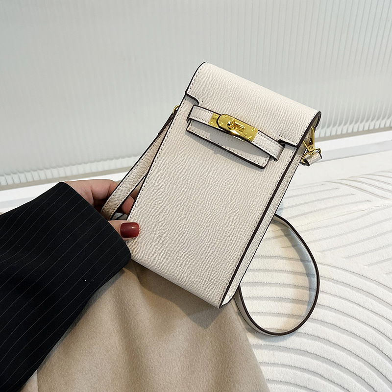 Bolsa pequeña texturizada para mujeres 2023 primavera y verano nueva moda retro bolsa de mensajero todo partido hombro teléfono móvil pequeña bolsa cuadrada