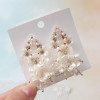 South Korean fashionable goods, white brand cute earrings flower-shaped from pearl, city style, simple and elegant design, flowered