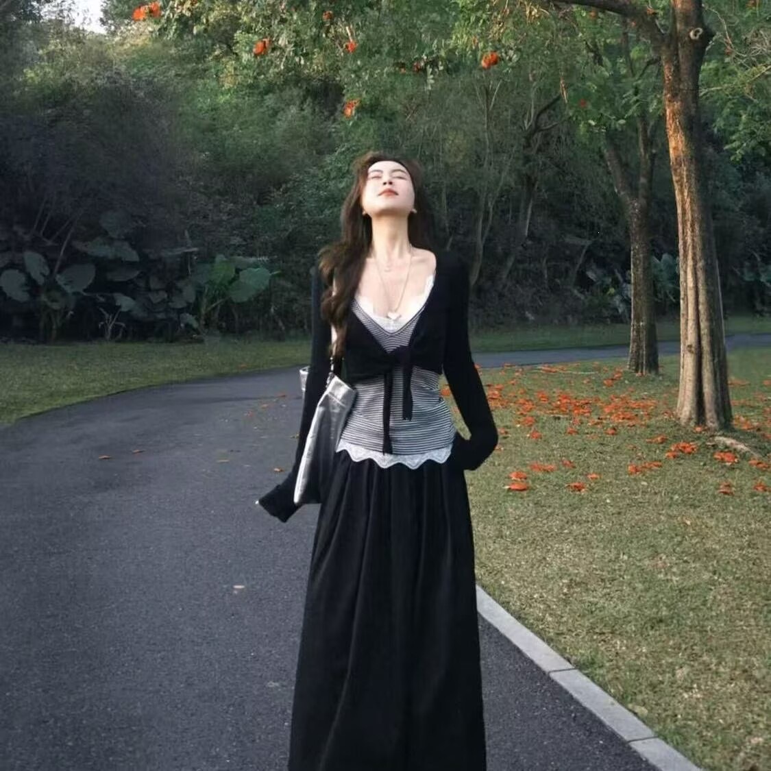Elegant and gentle three-piece suit for women in Korean style: long-sleeved sunscreen cardigan, striped camisole, and high-waisted slimming skirt