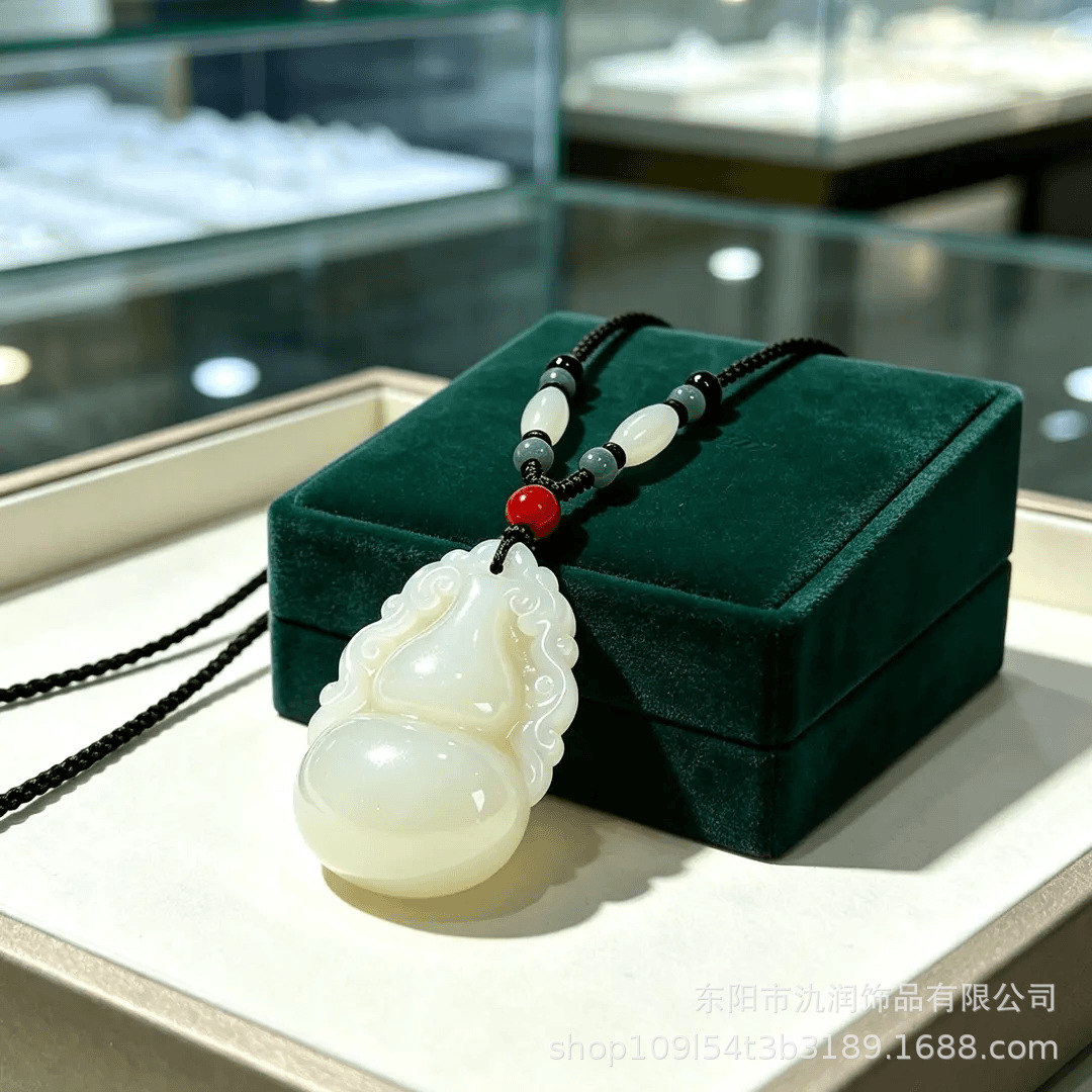 High-end light jade-colored imitation chalcedony glass necklace with a Ruyi floral design, featuring a long, ethnic-style pendant suitable for sweaters, manufactured by a specialized factory