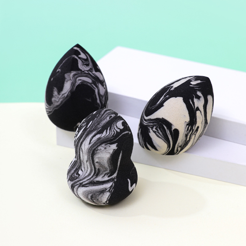 Personalizado de fábrica, mezcla de colores transfronterizos, maquillaje en forma de gota, soplo de polvo de huevo, no coma polvo, se agranda con el agua, esponja de maquillaje sin látex
