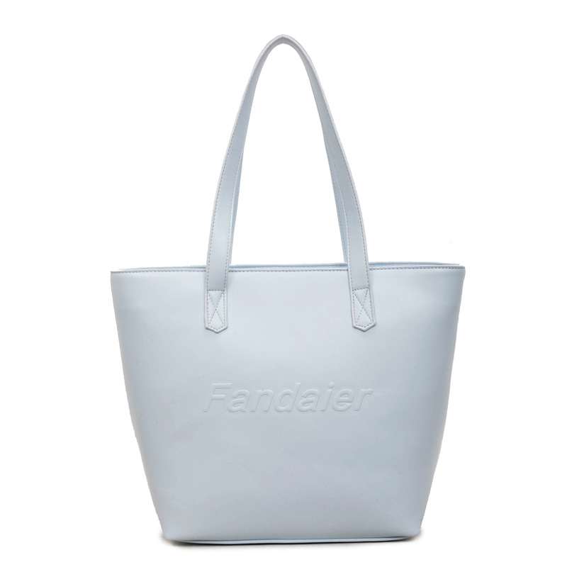 Casual gran capacidad bolso tote para mujeres 2026 venta caliente nueva ciudad simple moda versátil bolso de hombro axilar