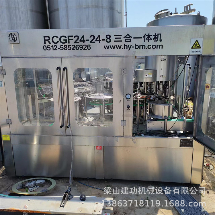 二手瓶装矿泉水灌装机 三合一灌装机 全自动果汁饮料液体灌装机