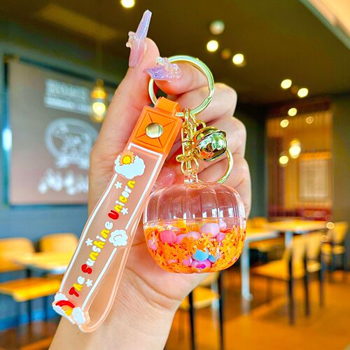 Oil-infused luminous pumpkin quicksand bottle key chain car pendant cartoon creative doll machine grab machine school bag gift pendant