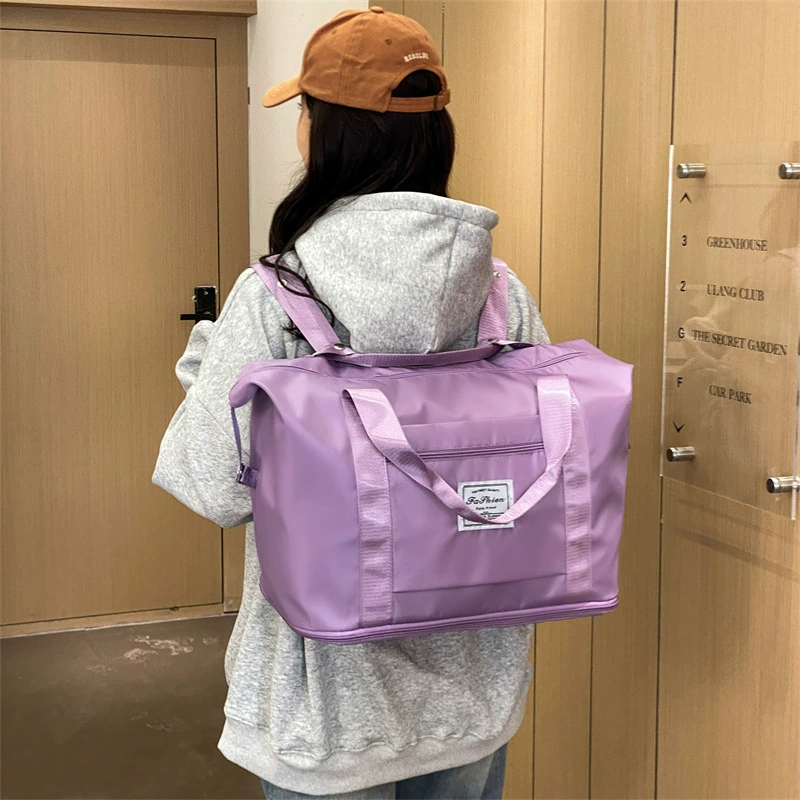 Capacious fashionable luggage travel bag to go out, worn on the shoulder