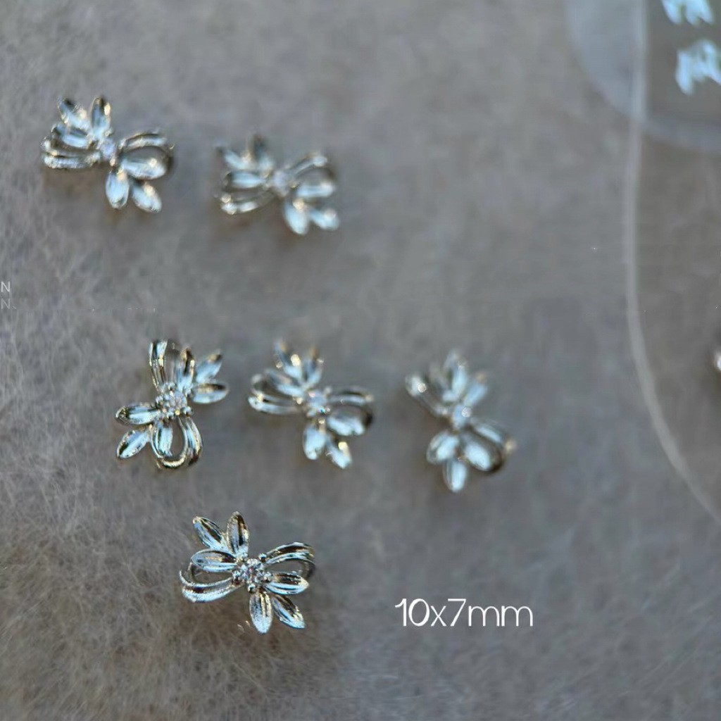 Celebridad de Internet nuevos accesorios de uñas Iris arco de alta retención de color ajuste arco de uñas diamante desgaste material de uñas diamante