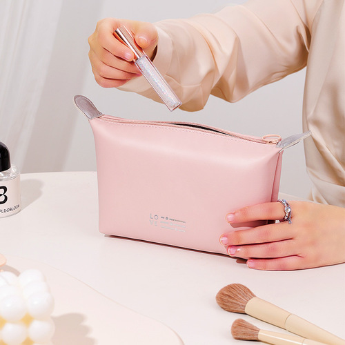 New exciting dumpling bag waterproof cosmetic bag toiletry bag convenient hand storage bag candy color cosmetic bag wholesale