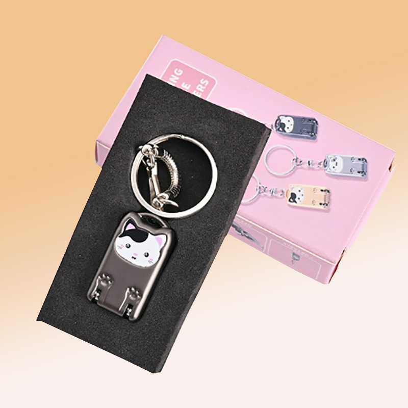 Spot portátil con cortador de uñas portátil de acero inoxidable, cortador de uñas plegable de deformación giratoria