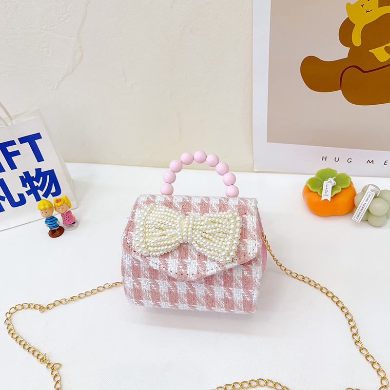 2022 nuevo arco de la celebridad en línea tejida bolso de los niños de las mujeres de estilo coreano lindo crossbody mini bolso de la perla