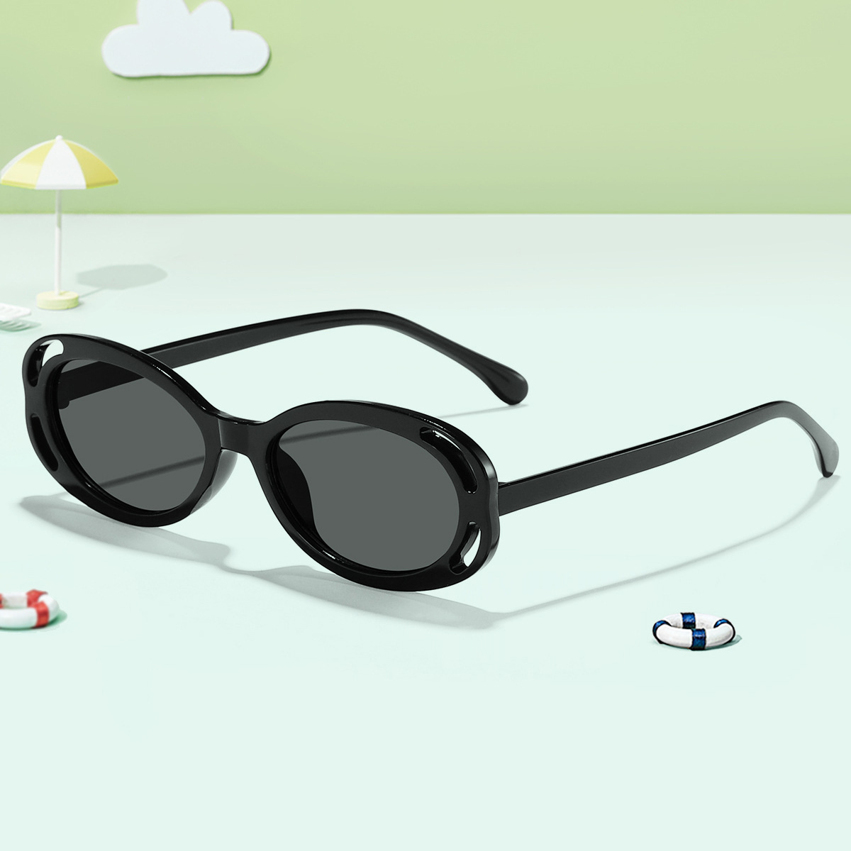 Los nuevos niños oval contraste color Camelia hueco personalidad moda gafas de sol calle hip hop desgaste esencial gafas de sol