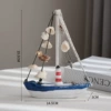 Small shell boat lighthouse
