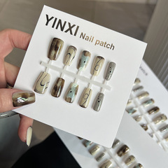 落書きの線がぼやけていて、プレハブは甲の短いタイプの2025の新型のinsネットの赤い半製品の爪の貼ることができます。