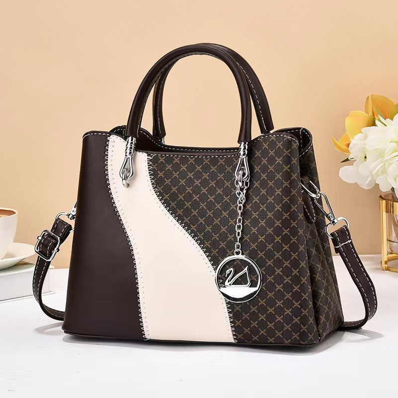 Fabricantes de bolsas de mano de textura nuevas bolsas de mujer de comercio exterior Taizhou bolsas de mujer una bolsa clásica