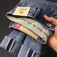 高級百合ジーンズ男性ファッション刺繍秋冬カジュアル水色修身弾力長ズボン古士狼