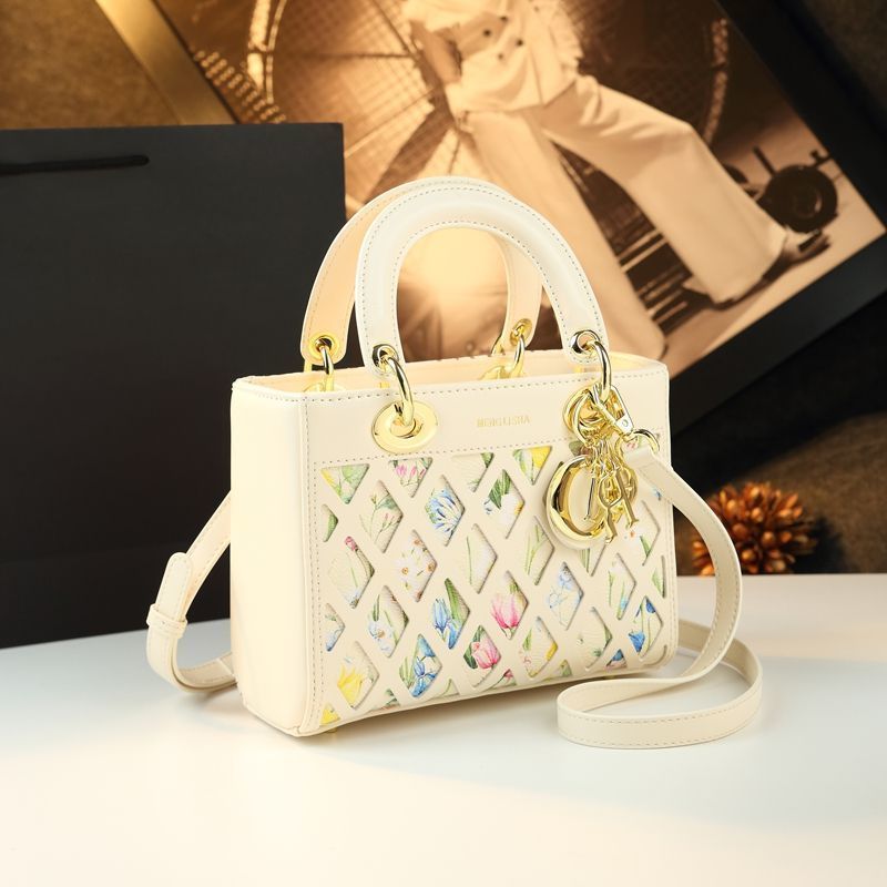 Túi đeo chéo nữ thời trang đa năng thiết kế độc đáo chất liệu rỗng — trắng