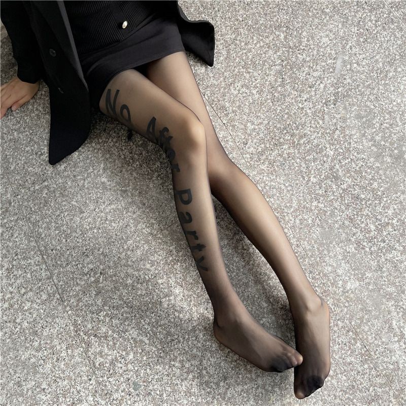 Super fire NO letter pantyhose women feel black silk black bare leg artefact ins trend net red thin spring and autumn pantyhose