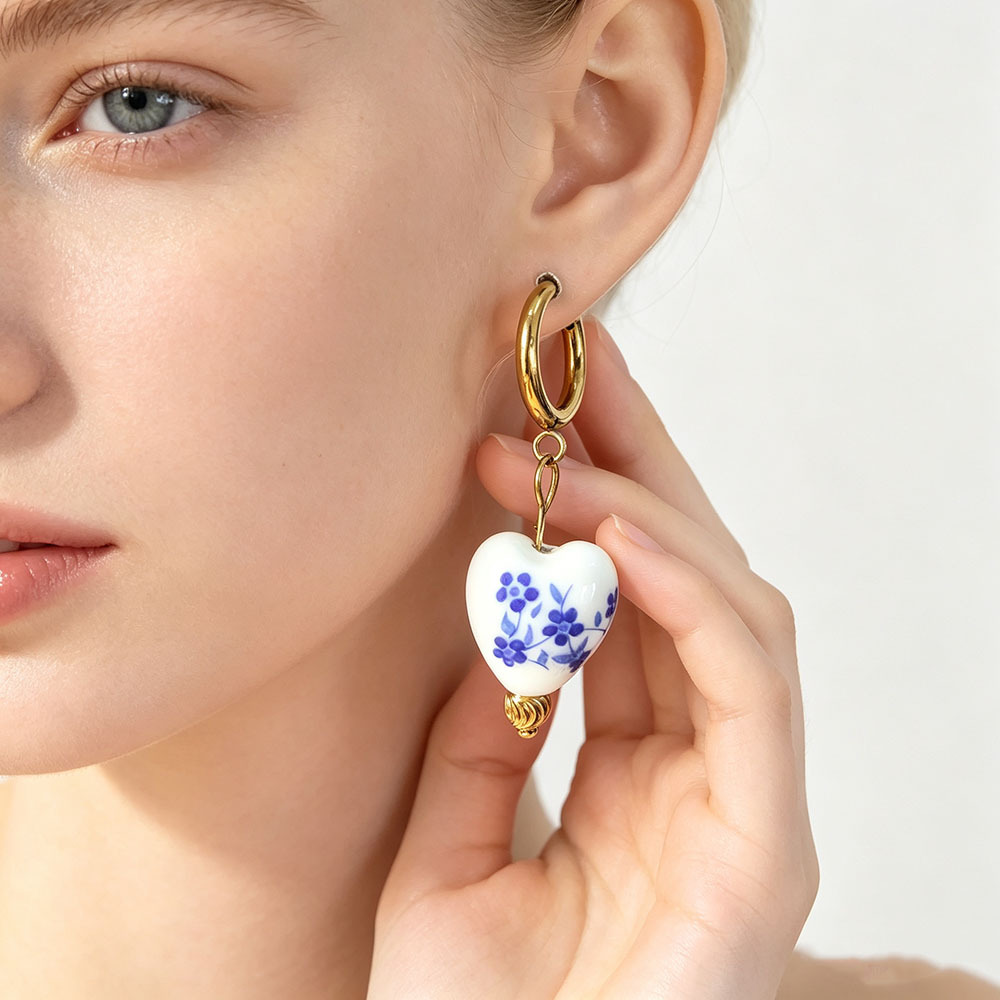 Diseño único retro nicho de alta sensación pendientes de acero inoxidable flores animales pendientes irregulares joyas de lujo ligero