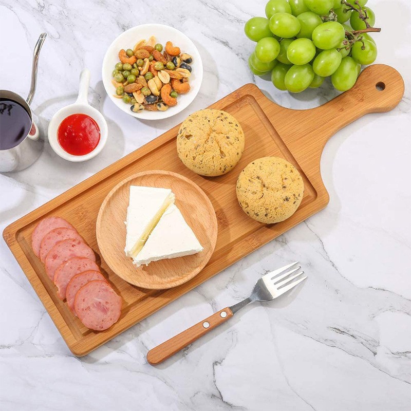 Nueva tabla de cortar de bambú fábrica al por mayor tabla de cortar de bambú hogar herramientas de cocina tablero de pizza tablero de queso de Bambú