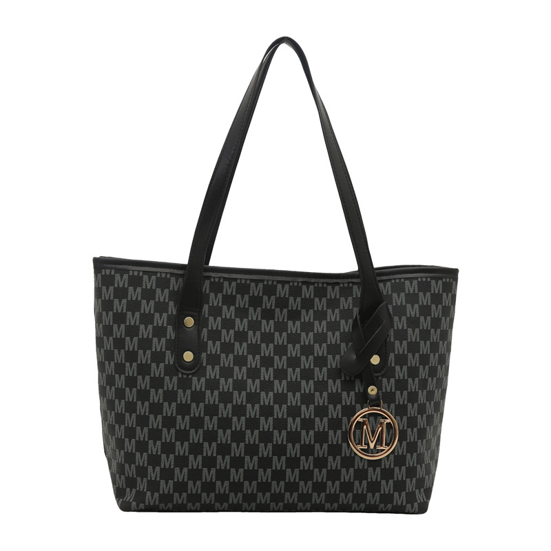 Bolsos de gran capacidad para mujer 2025 nueva primavera y verano todo-fósforo diseño de nicho clase bolso de viaje de un solo hombro bolso portátil