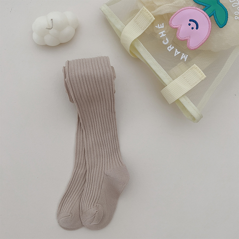 Nuevo color sólido rayas verticales polainas de las muchachas del otoño y el invierno estilo coreano ocasional los niños ropa exterior pantimedias blancas en stock