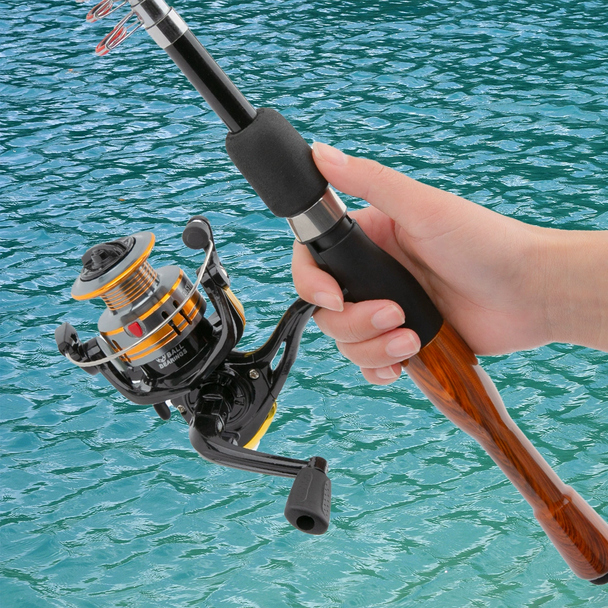 Carrete giratorio 12+1 rodamientos con caña de pesca retráctil