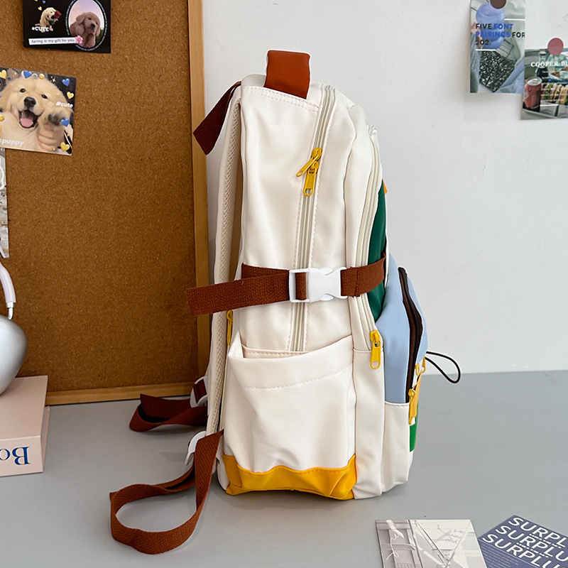 Mochila de gran capacidad 2024 nueva mochila de color en contraste para estudiantes al aire libre viajes de ocio mochila de todo fósforo para mujeres al por mayor