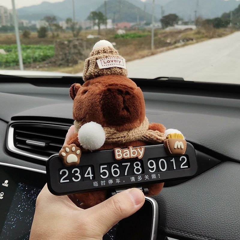 Placa de estacionamiento temporal de automóviles encantadora creativa capibara muñeca delfín muñeca muñeca tarjeta telefónica móvil