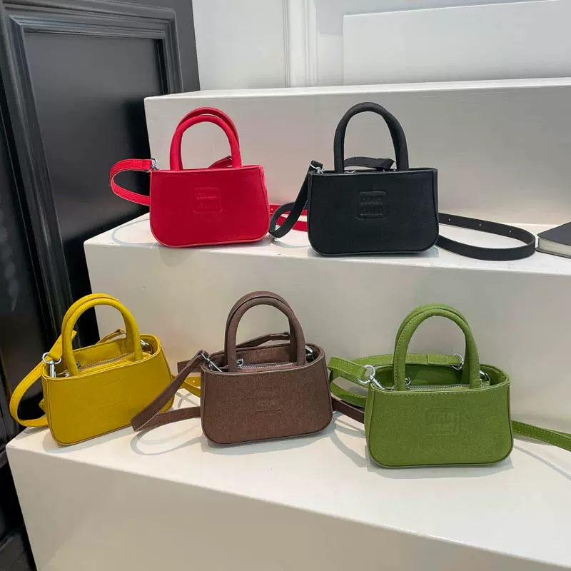 流行高级手拎女包春季新款简约字母轻奢通勤单肩斜挎儿童零钱包潮