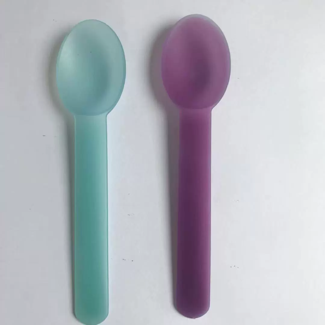 Green purple spoon for ice cream
