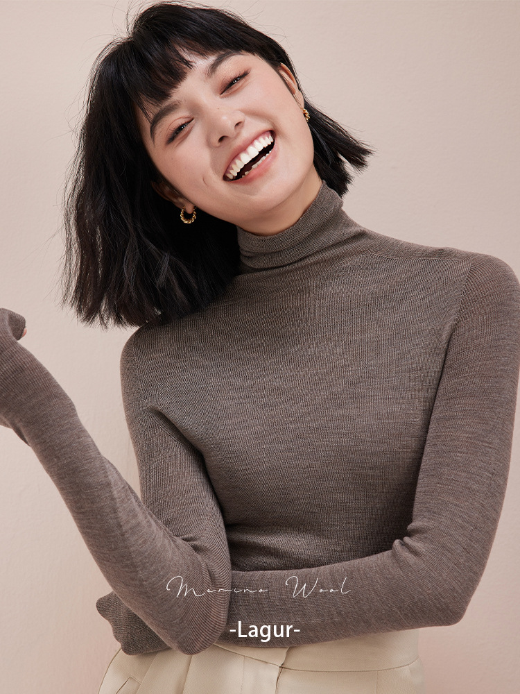 トップスは新年の赤色、シームレスな一体型揚子紡績100％ウールニット、女性用スリムフィットハイネックセーター