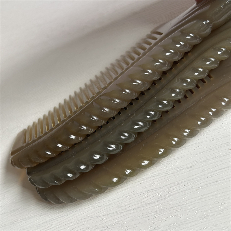 White Yak Horn Comb Round Handle Massage Hair Comb 18cm Carved Design in use