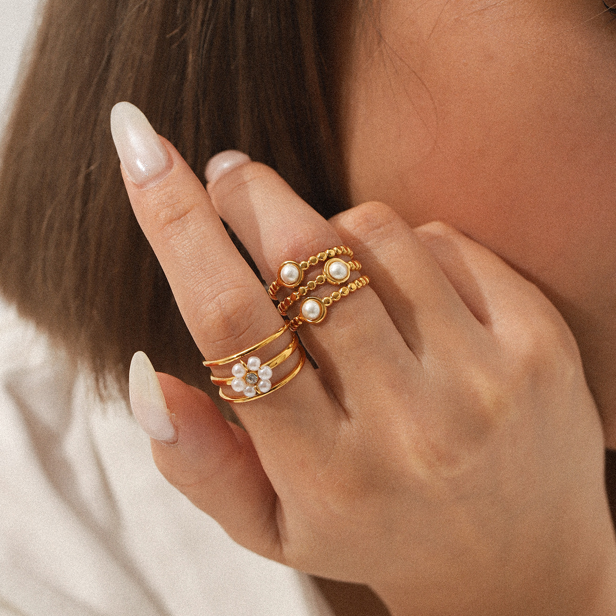 Diseño transfronterizo europeo y americano anillo abierto de acero inoxidable de tres capas flor anillo de perlas mujer no se desvanece joyería de acero de titanio