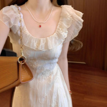 法式杏色小飞袖连衣裙子女夏季2025新款海边度假云南旅游穿搭长裙